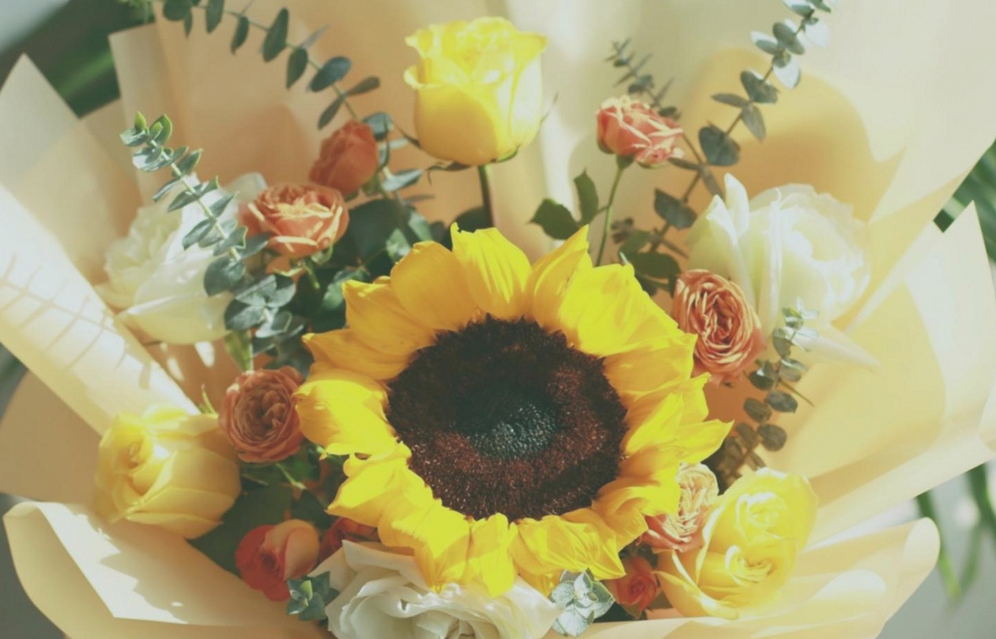 Floral arrangement process during a group workshop